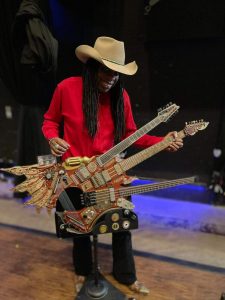 Larry Mitchell with the monstrous triple-neck Hydra during Inviolate tour